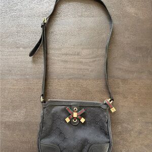 Gucci Black Crossbody Bag with Gold Accents